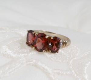 Oval Garnet Three Stone 9ct Gold Ring