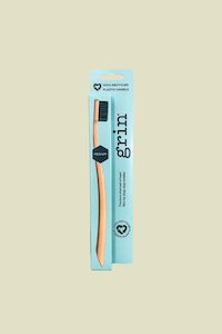 Grin Medium Toothbrush Orange