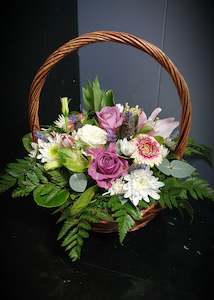 Florist: Sweet little basket of flowers