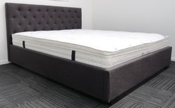 Bed: Double charcoal upholstered bed &. Pillow top mattress