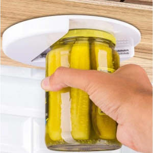 Jar opener under cabinet