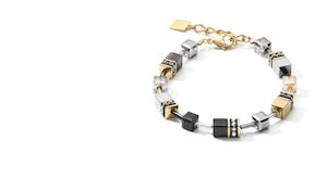 COEUR DE LION BRACELET GOLD PLATED ST/ST GEO-CUBE IN BLACK/GOLD & TITANIUM OXIDE…