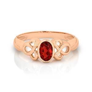 9K RG OVAL BEZEL SET GARNET CELTIC RING