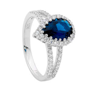 ELLANI STG SILVER LONDON BLUE PEAR CZ, WH CZ SURROUND W/ SPLIT BAND RING