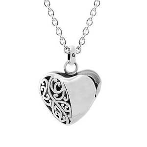 Jewellery: Evolve Necklaces koru heart locket with chain