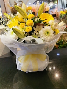 Florist: white and yellow arranged