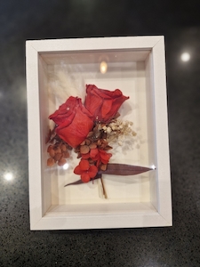 Dry flowers in photo frame