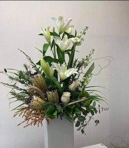 Florist: Exquisite seasonal arrangement.