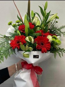 Florist: Festive Christmas  Bouquet.