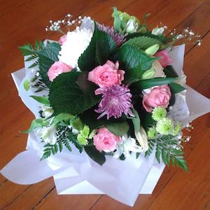 Pink and white bouquet in a Vox box