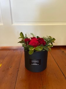 Roses in a hatbox