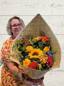 Florist: Harakeke wrap bright bouquet