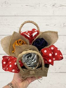 Florist: Harakeke flower in kete basket