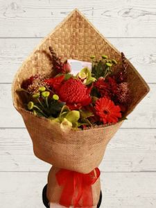 Florist: Harakeke wrap red bouquet