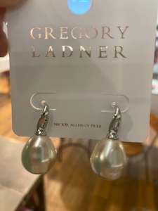 Clothing: Gregory Ladner Gold Pearl Hook drop earring