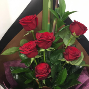 Brownie points -1/2 dozen red roses