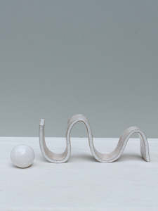 Sculptural Wiggle with a ball.