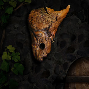 Graphic design service - for advertising: Bacchus driftwood mask Fossil Studios