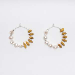 Jewellery: Kōwhai pearl hoops by Avara Studio made in Tāmaki Makaurau, Aotearoa