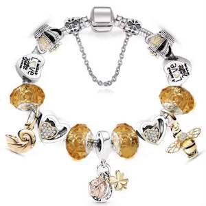 Silver Charm Bracelet with 13 free Charms "Crown and Bee"