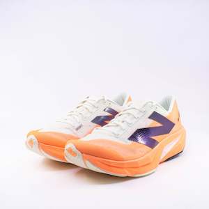 Shoe: New Balance FuelCell Rebel v4 (D Standard) Mens Hot Mango with Angora and Black