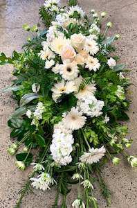 White and Green Funeral Casket