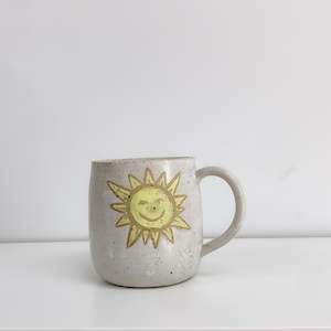 Handmade Speckled White Mug with Sun