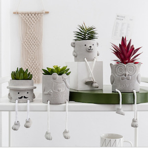 Doll Head Artificial Planter With Dangling Legs