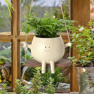 Charming Resin Face Planter with Swing