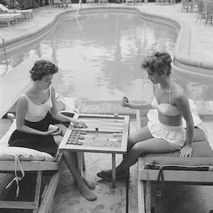 Slim Aarons 'Backgammon by the Pool' photographic print