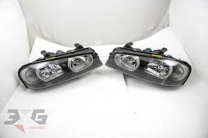 Exterior: Nissan R34 Skyline Xenon HiD Head Light Set ER34 GTT GT-T Headlight 98-02