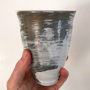 Grey and white beaker