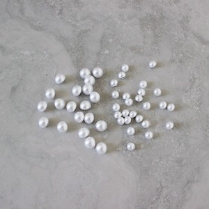 Textile wholesaling: PEARL BUTTON