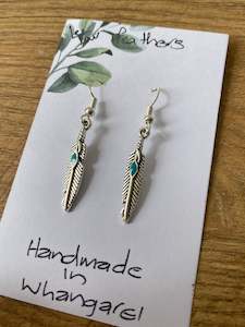 Taonga Jewelry: Feather earrings