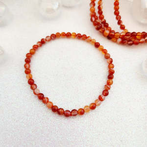 Carnelian/Agate Bracelet (assorted. approx 5mm round beads)