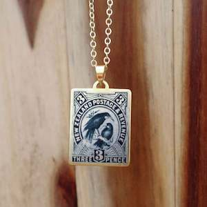 Staff Picks: Huia– 1898 Pictorial Stamp Necklace