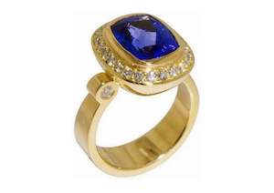 Coloured Stone Rings: Antique Cushion Tanzanite Halo Design