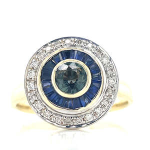 9k Gold 0.53ct Teal Sapphire,16=0.46ct Tapered Baguette Sapphires,23=0.11ct Diamonds Ring