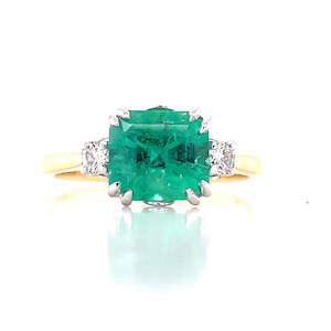 Watch: 18k B/Tn Emerald & Diamonds Ring