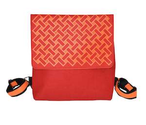 Wholesale trade: orange harakeke weave on red · red backpack