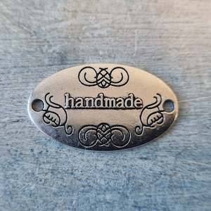 Antique Oval "handmade"tag Silver 32mm x 19mm