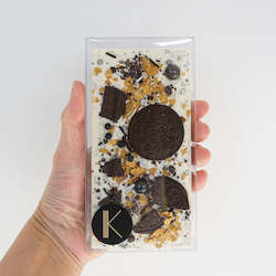 COOKIE AND CREAM WHITE CHOCOLATE BAR WITH GOLDEN WAFER