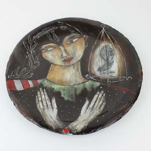 Woman with bird cage plate