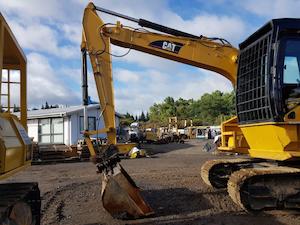 Industrial machinery or equipment wholesaling: Caterpillar 312C Excavator