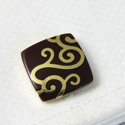 Gold swirl cufflinks