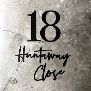 Handwritten cursive steel custom house number & street name