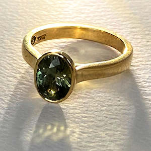 Jewellery manufacturing: Green Sapphire Rub-over Ring