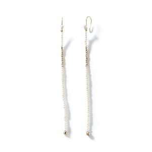 LONG DANCING PEARL AND GOLD ACCENT 14-carat gold earrings Lulu's Collective