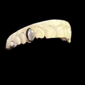 One tooth in Sterling Silver