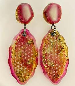 Jewellery: Cateye earrings, raspberry, amber, glow in the dark and gold glitter